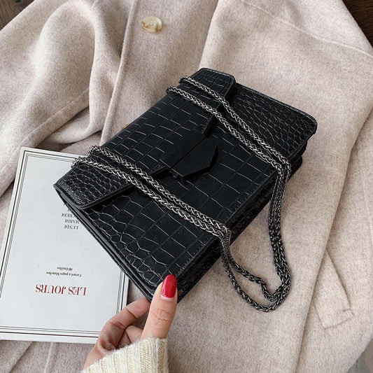 Inclined shoulder bag